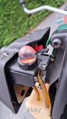 Qualcast petrol strimmer / brush cutter