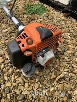 Stihl FS94 Strimmer With Stihl Blade And Harness