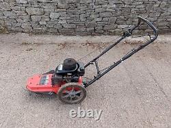 Wheeled grass strimmer