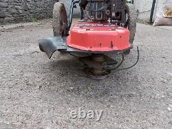 Wheeled grass strimmer