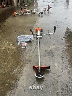 Débroussailleuse à essence Stihl FS 400 avec huile pour corde de coupe