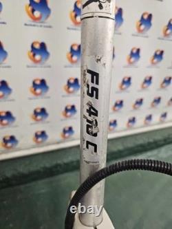 Débroussailleuse thermique Stihl FS 410 C avec tête à avance par frappe et protecteur de coupe M