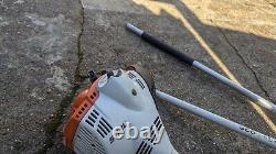 Scie à chaîne sur perche et débroussailleuse / coupe-bordures KOMBI STIHL km50