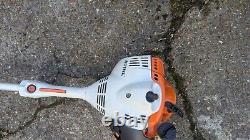 Scie à chaîne sur perche et débroussailleuse / coupe-bordures KOMBI STIHL km50