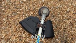 Titan Kombi Débroussailleuse/Coupe-brosse Perche Scie à Chaîne + Ext